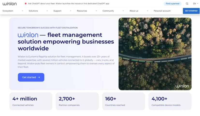 Wialon homepage describing its fleet management solution, with counts of connected vehicles, partners and device models